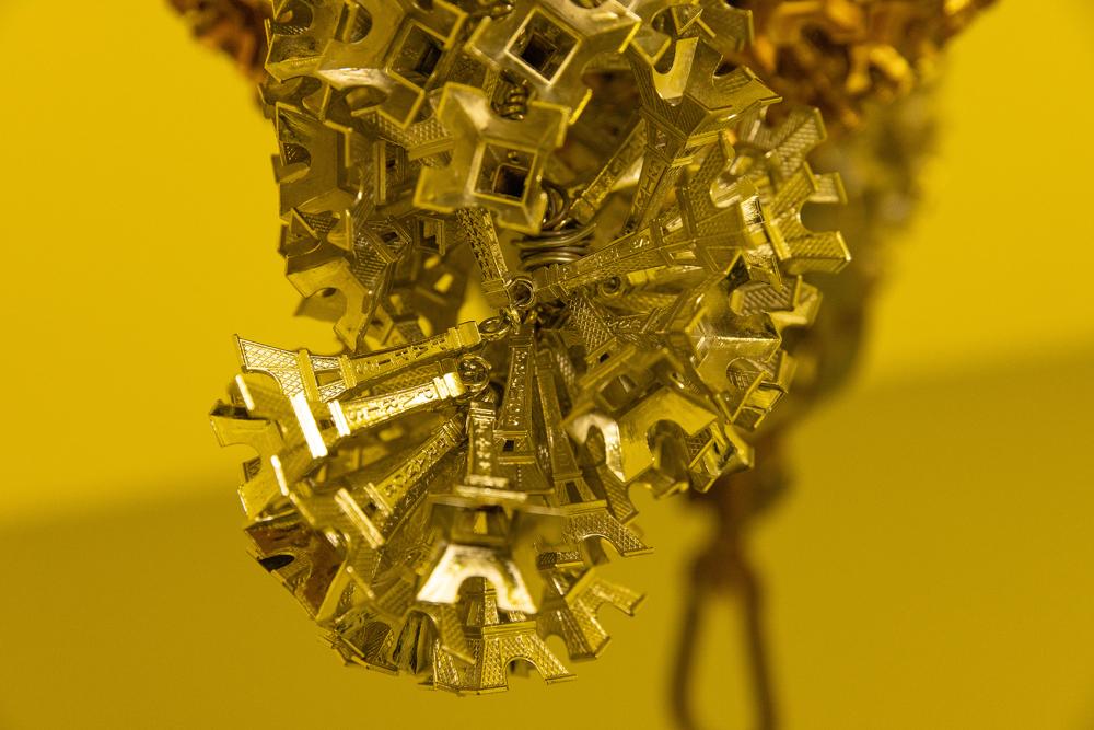 Kenny Dunkan, MALFOUTI, 2022, (detail) metal eiffel towers, dried squash, engine, 120 x 60 x 60 cm © basis e.V., photo: Bernd Euring